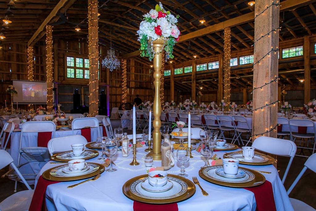 red and gold wedding reception tablescape
